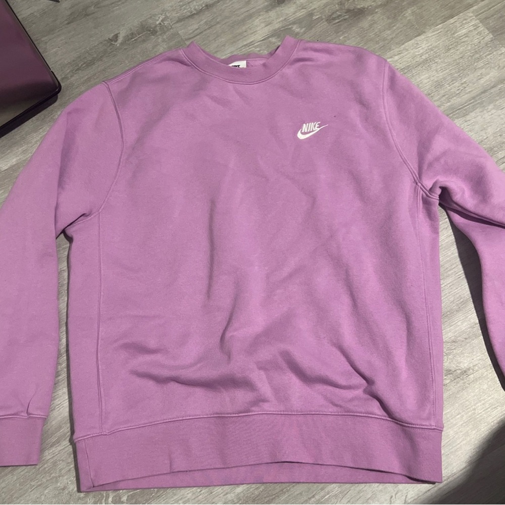 purple Nike sweatshirt